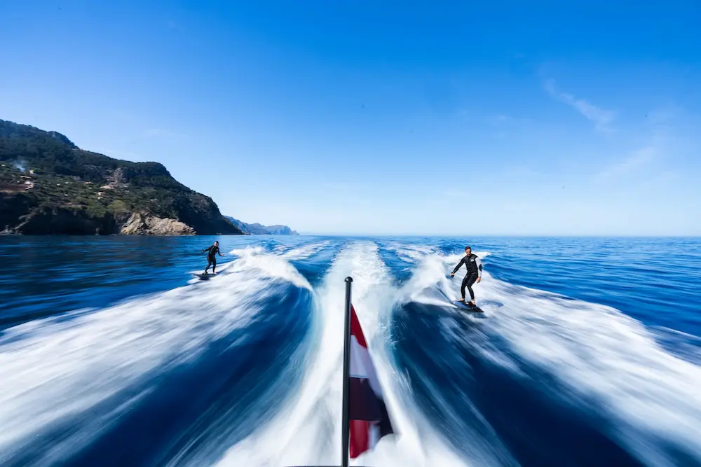 Two people riding Awake boards.
