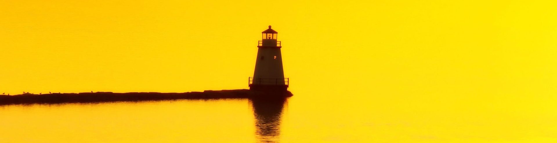Lake Champlain lighthouse at sunset.